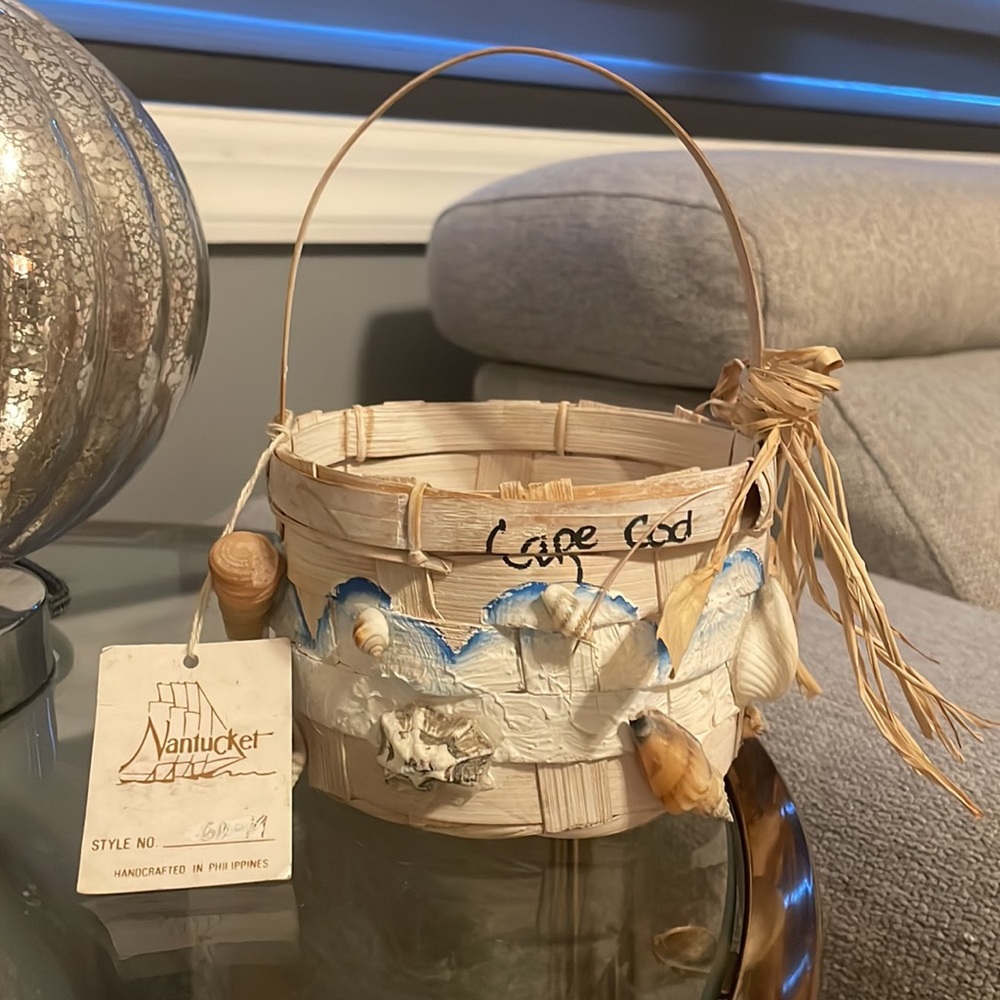 Vintage Nantucket Cape Cod basket adorned with seashells and hand painted waves